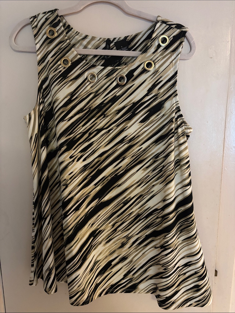 Sleeveless Black and Cream Patterned Sleeveless Blouse with Grommet Detail